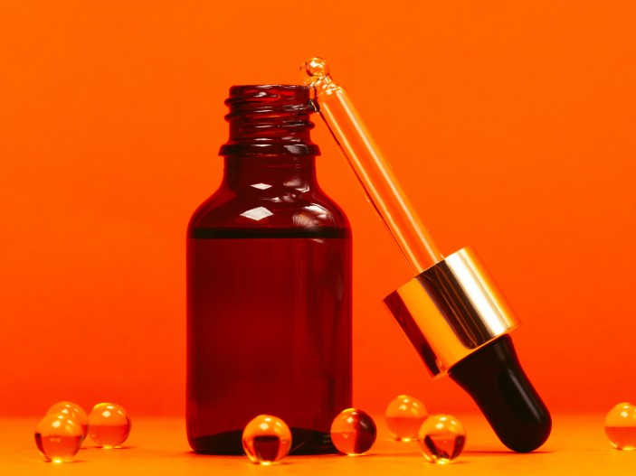 Serum Bottle And Vitamin