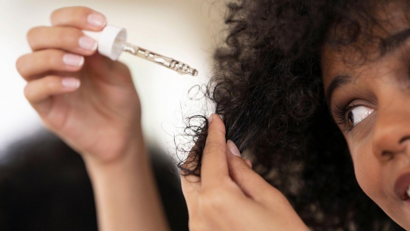 Applying Hair Oil Canva
